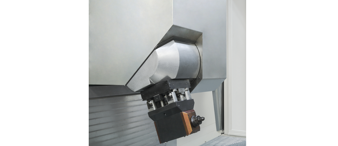 Partial machining from beneath by bolting heavy angular milling heads above a four-point support